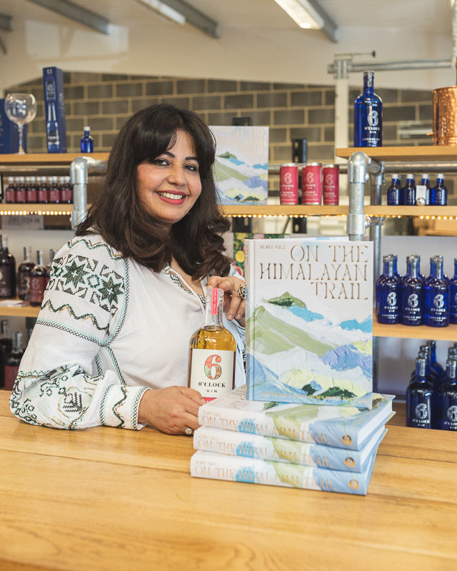 Romy Gill at the 6 O'clock Gin Distillery with her book On The Himalayan Trail, and Mango, Ginger & Lime Gin